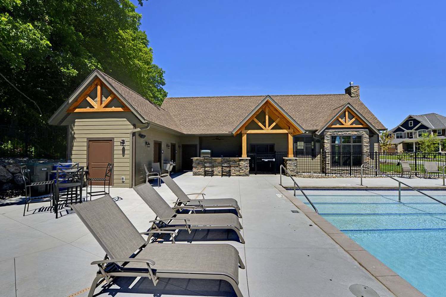 A poolside James Hardie Contracted Home